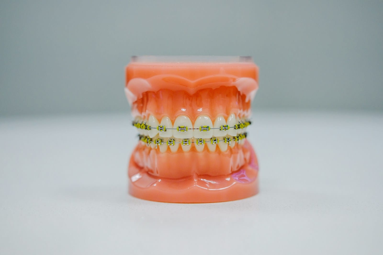 orange green and yellow plastic teeth